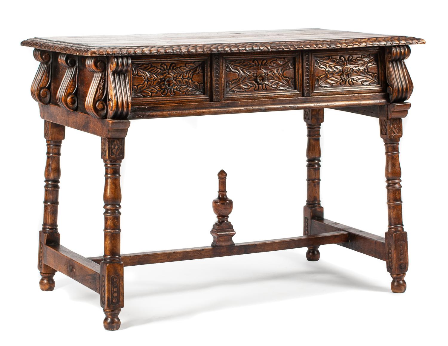 A Portuguese Renaissance Style Walnut Table Height 36 x width 50 x depth 26 inches.