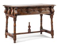 A Portuguese Renaissance Style Walnut Table Height 36 x width 50 x depth 26 inches.