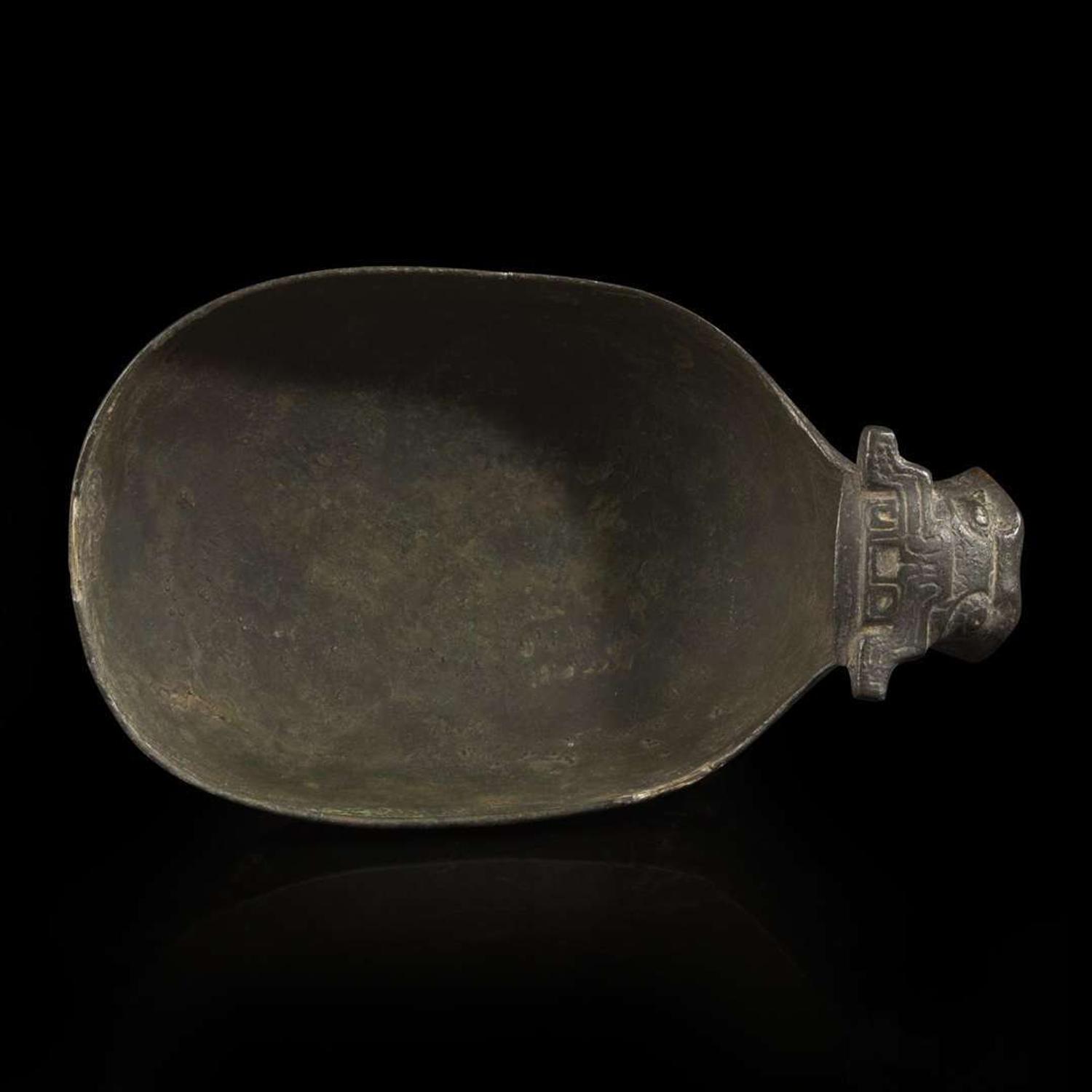 A Chinese archaic bronze animal-form pouring vessel, Yi 青铜兽形匜 Late Eastern Zhou period ????
