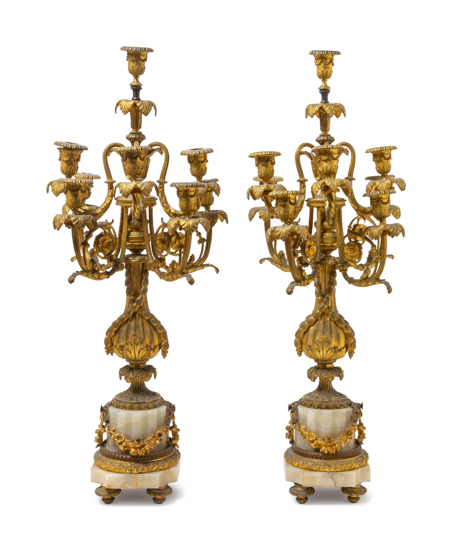 A Pair of Louis XVI Style Gilt Bronze and Onyx Eight-Light Candelabra