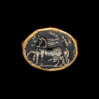 A Roman Gold Finger Ring with an Intaglio of Nike Riding a Chariot