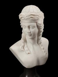 A Set of Four Bi-Color Marble Busts