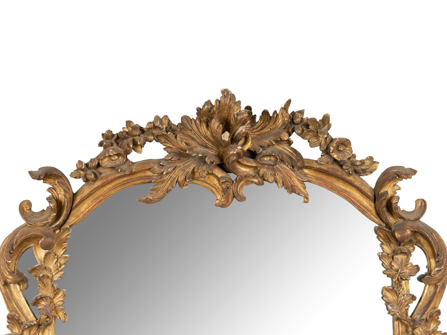 A Rococo Style Giltwood Mirror