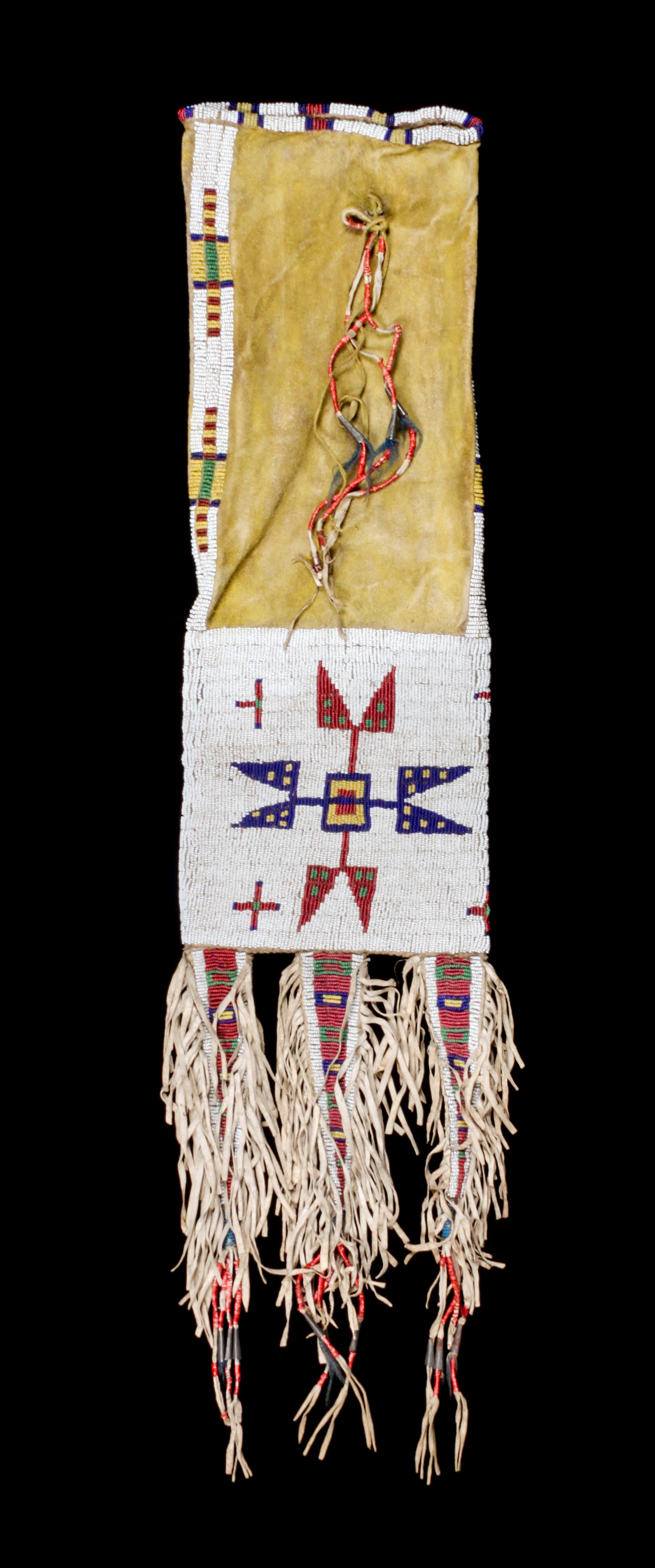 A Sioux Beaded Tobacco Bag Length 19 inches to bottom of bag, 30 inches overall. — CIRCA 1890