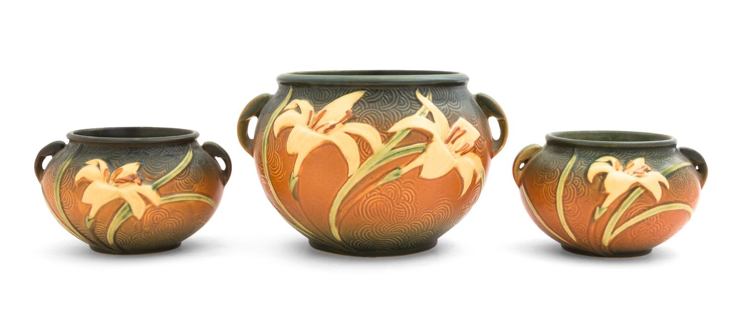 Three Roseville Zephyr Lily Pottery Jardinieres Height of larger 6 1/4 inches.
