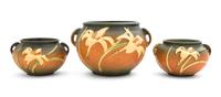 Three Roseville Zephyr Lily Pottery Jardinieres Height of larger 6 1/4 inches.