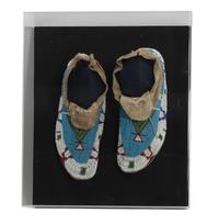 A Pair of Sioux Mocassins Length 10 inches — CIRCA 1910