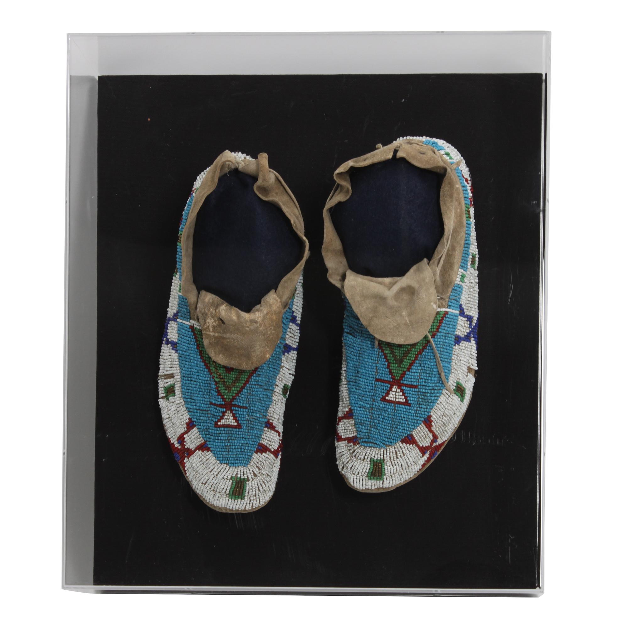 A Pair of Sioux Mocassins Length 10 inches — CIRCA 1910
