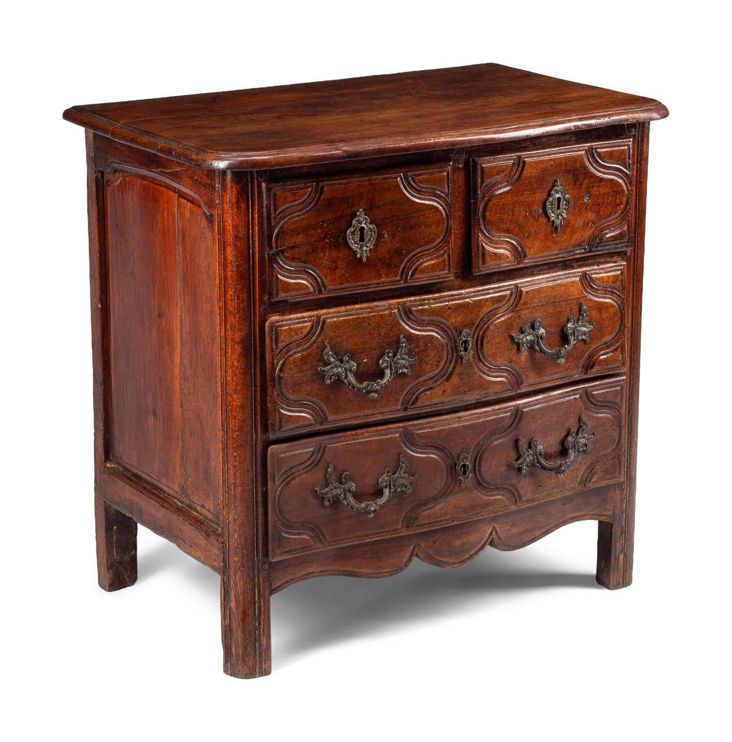 A Louis XV Provincial Walnut Small Commode