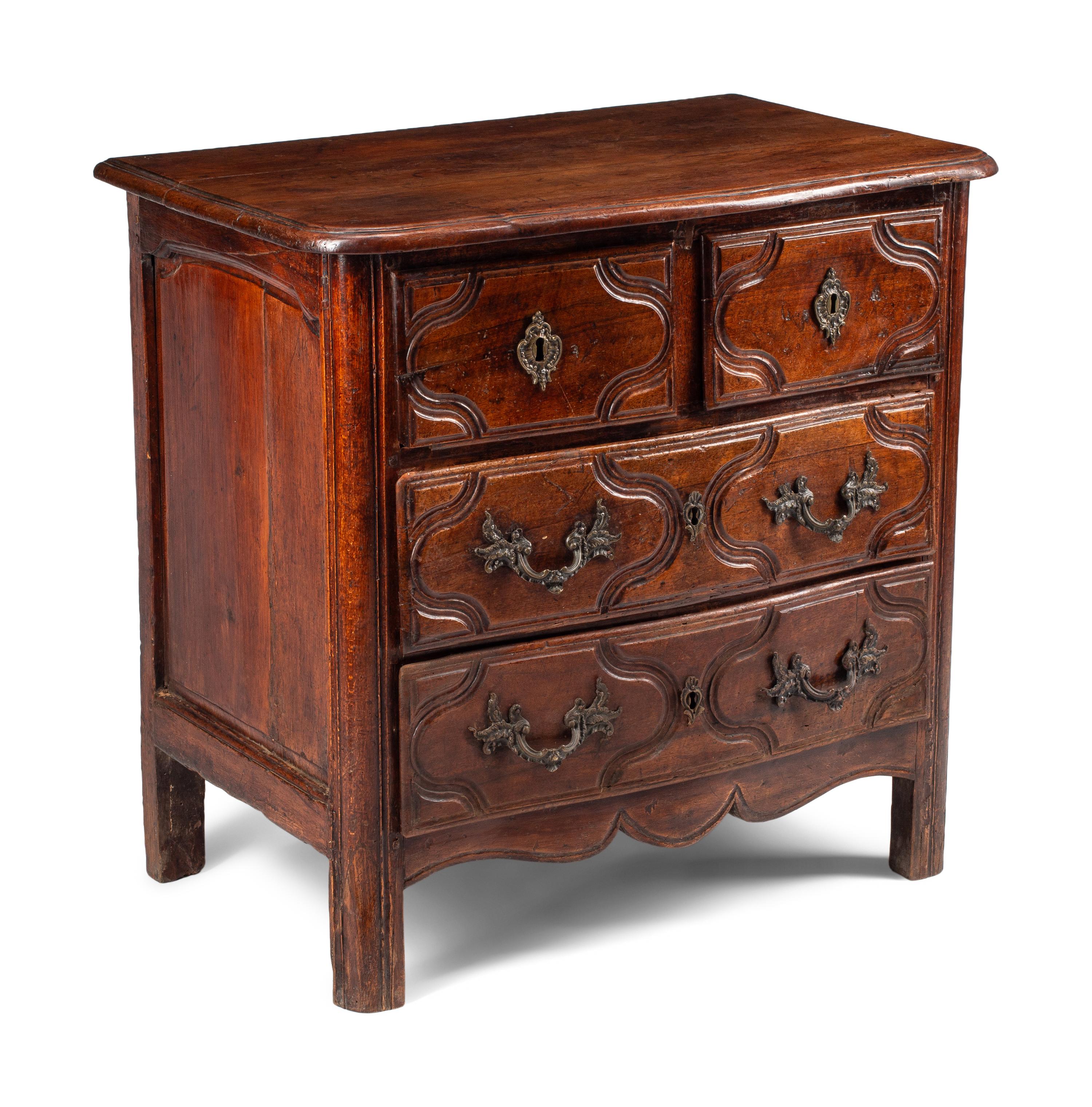 A Louis XV Provincial Walnut Small Commode