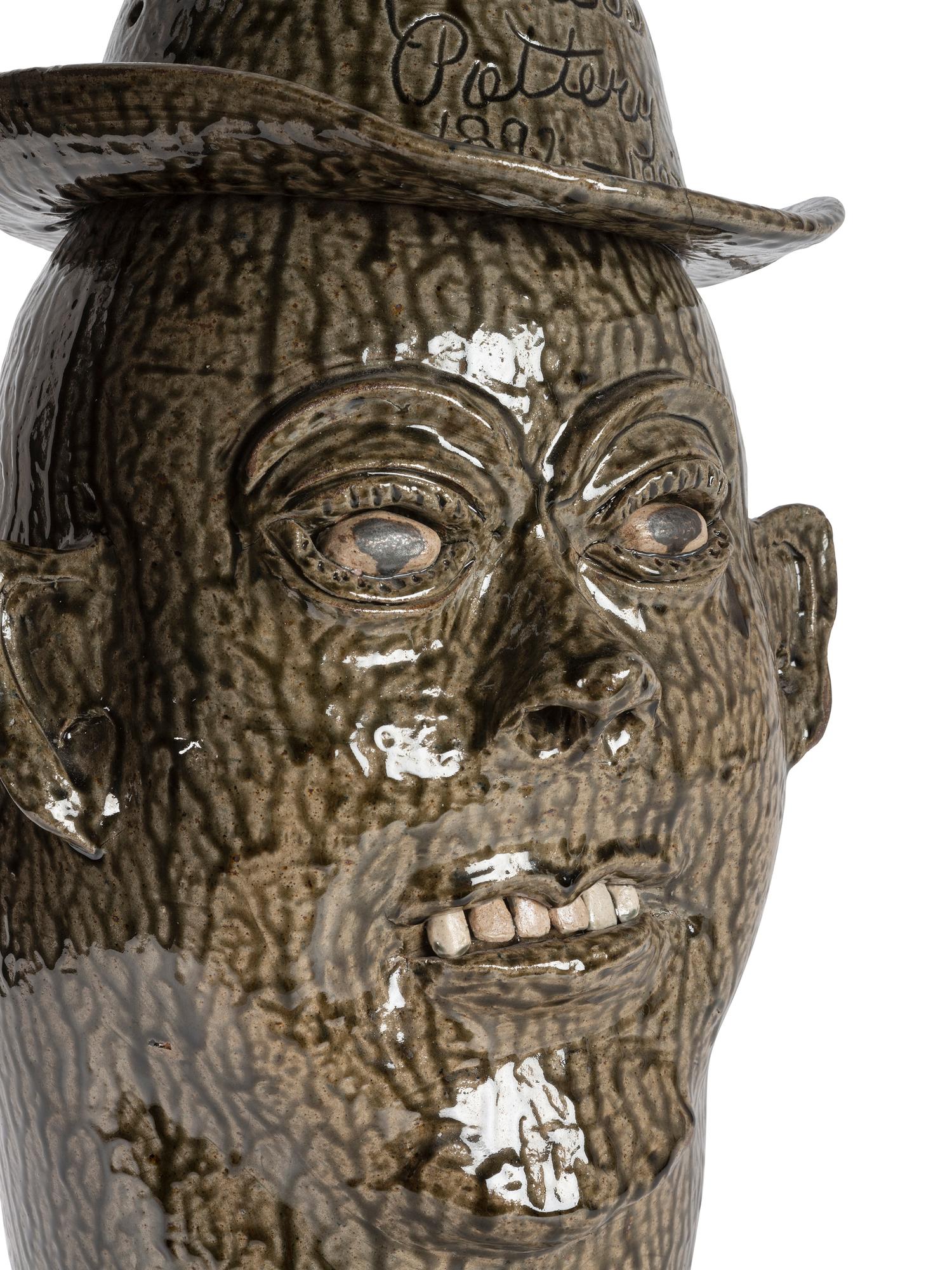 A Cleater and Billie Meaders Stoneware Face Jug
