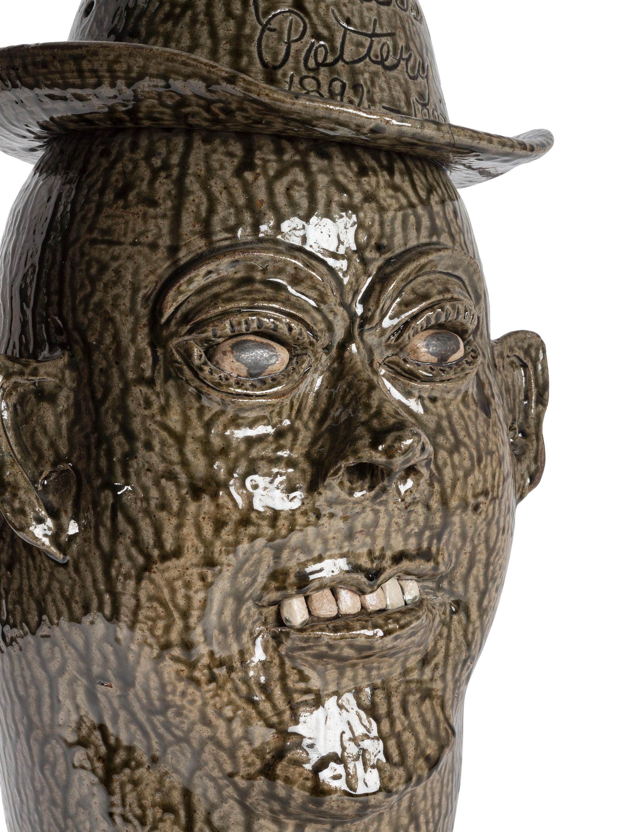 A Cleater and Billie Meaders Stoneware Face Jug