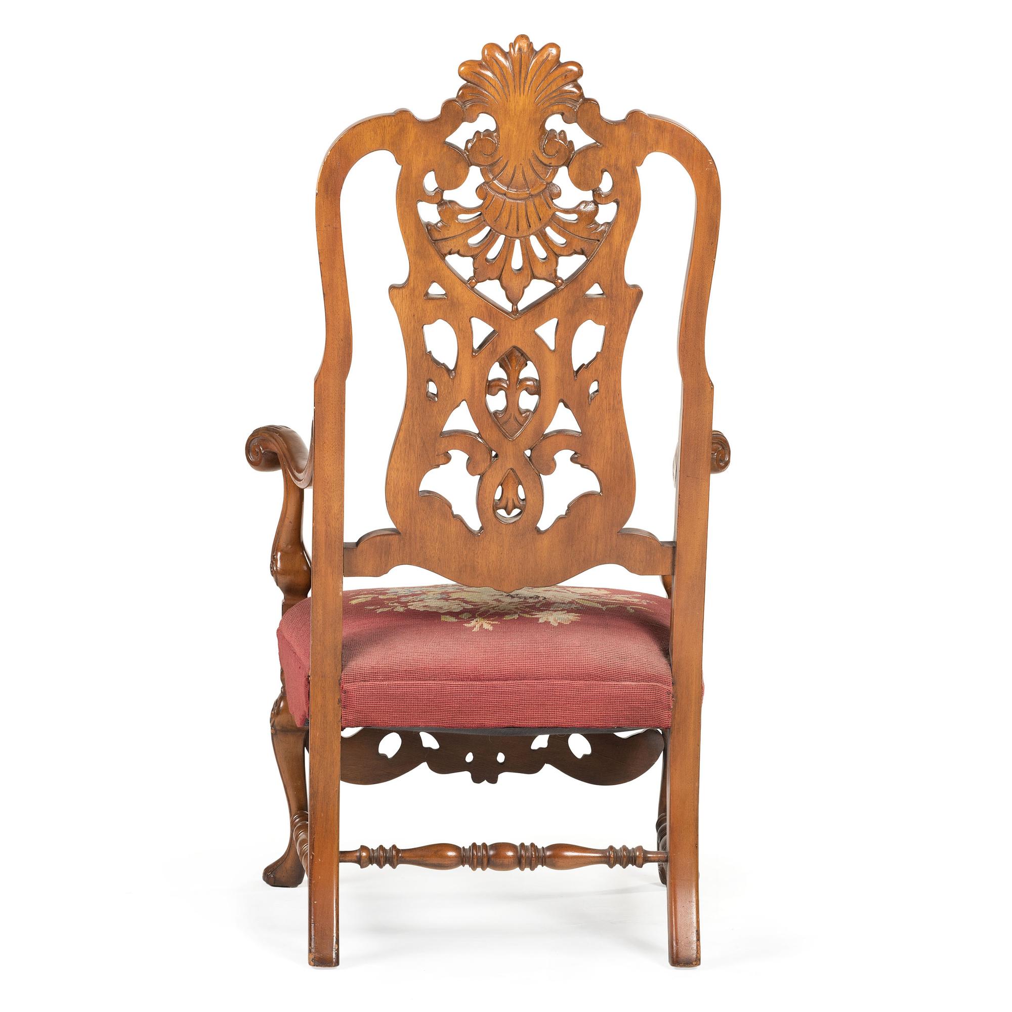 A Renaissance Revival Carved Hall Chair in Walnut with Shell-Form Crest and Pierced Back Splat