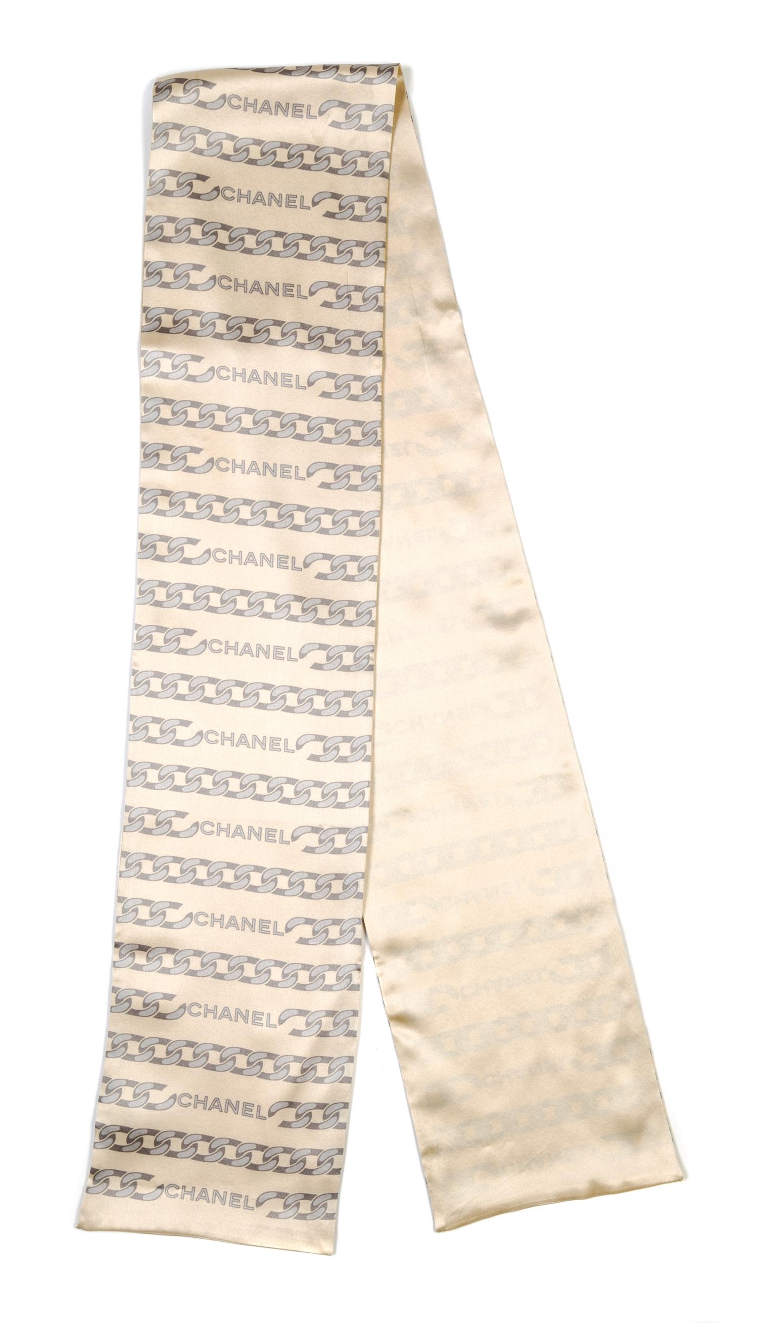 A Chanel Cream Silk Print Bandeau Scarf, 57" x 5.75".