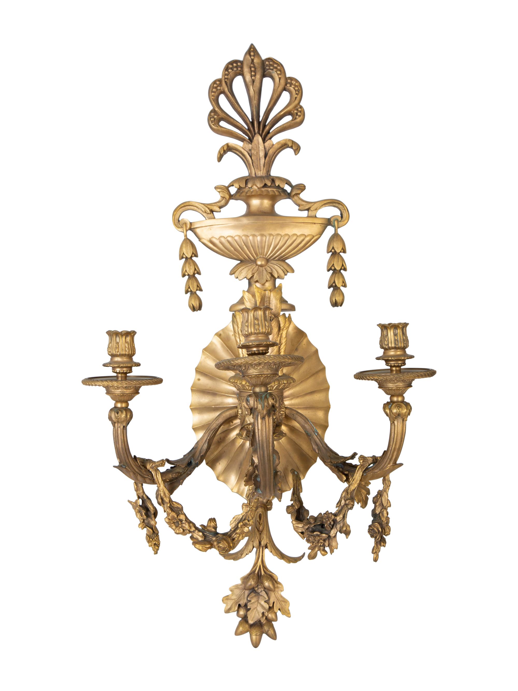 A Pair of Louis XVI Style Gilt Bronze Three-Light Sconces — EARLY 20TH CENTURY