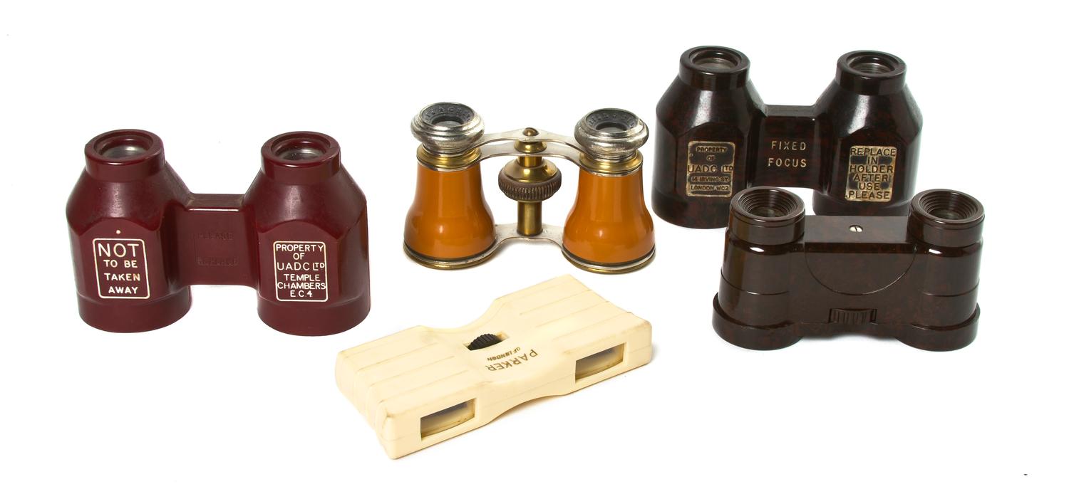 Five Pairs of Plastic Cased Opera Glasses, Width of widest 4 1/4 inches.