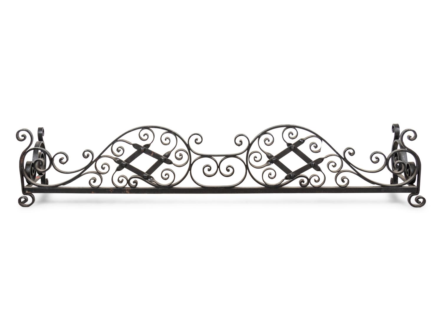 A Wrought Iron Fireplace Fender