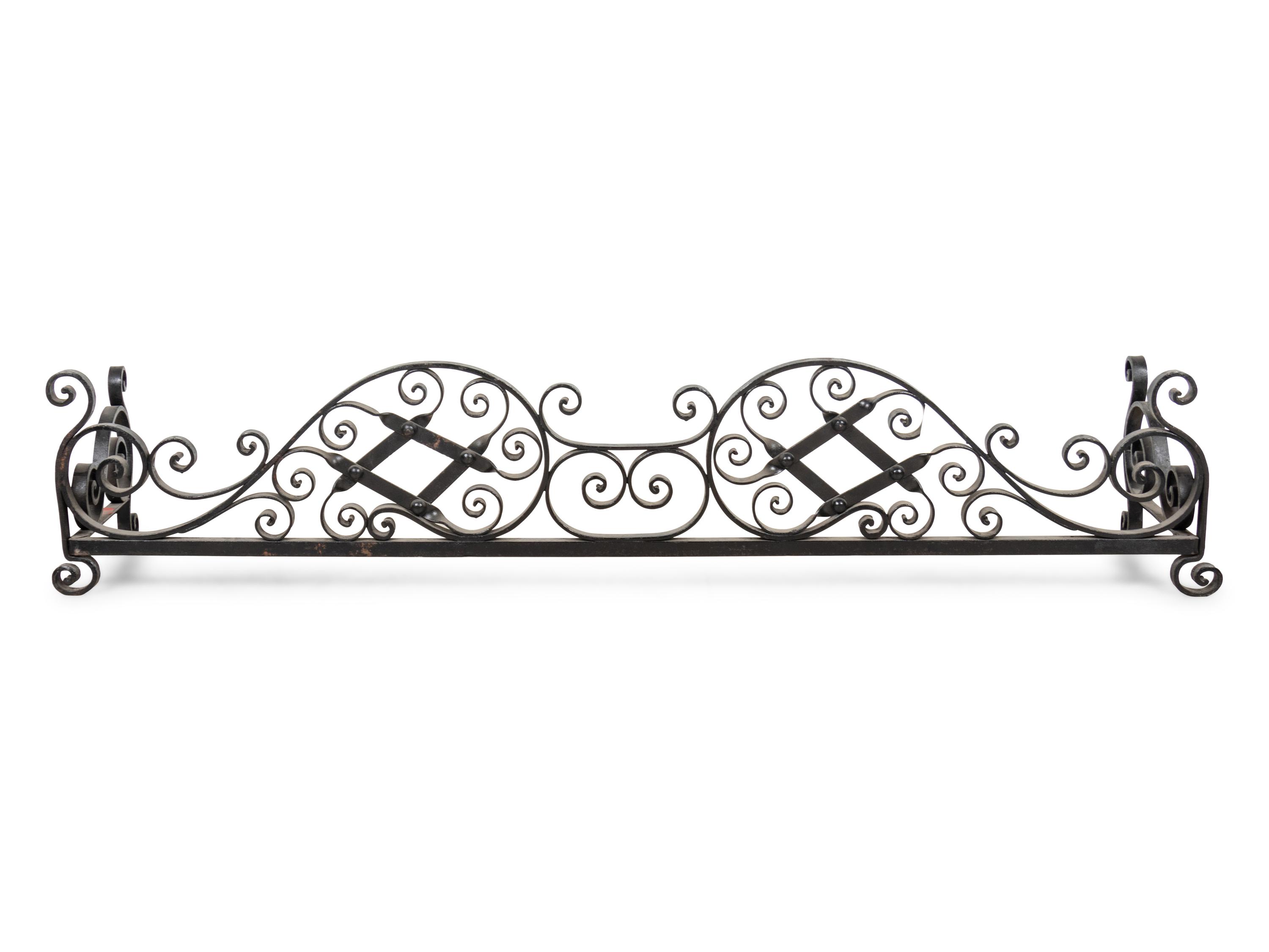 A Wrought Iron Fireplace Fender