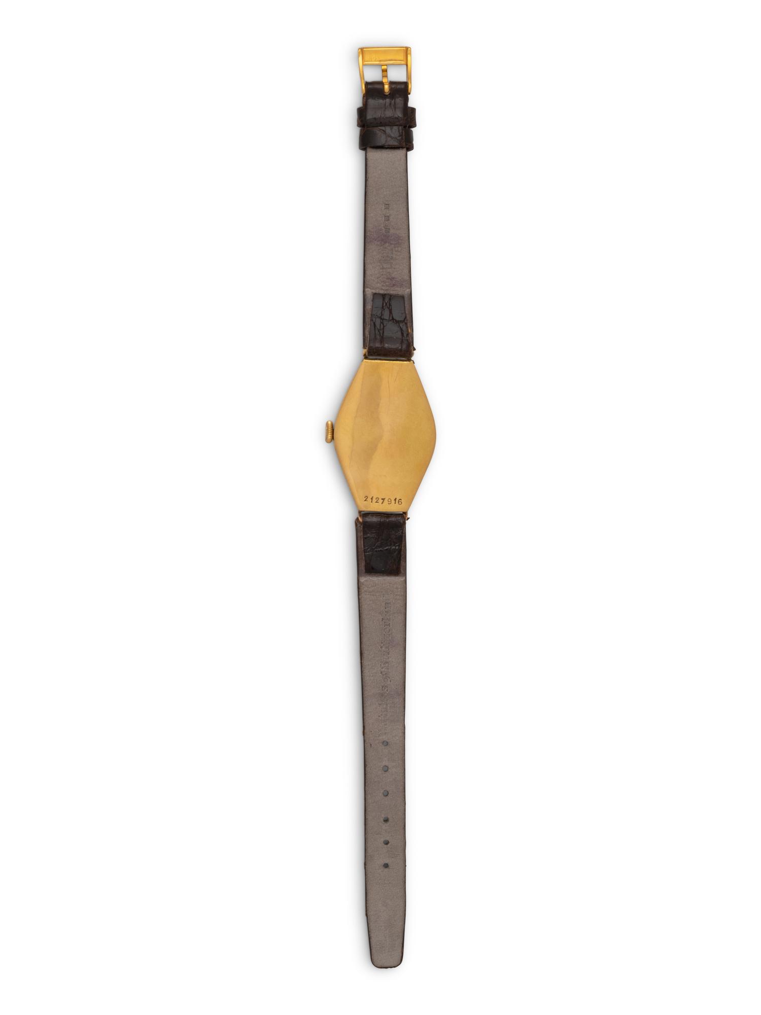 PATEK PHILIPPE, 18K YELLOW GOLD 'TONNEAU' WATCH