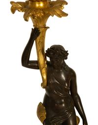 A Pair of Patinated and Gilt Bronze Figural Five-Light Candelabra Mounted as Lamps