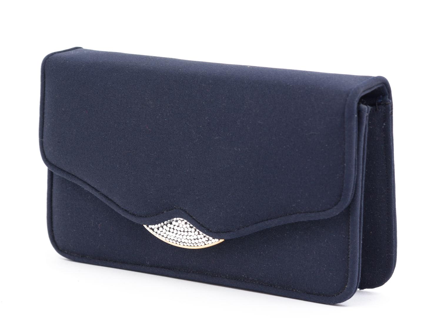 A Judith Leiber Navy Nylon Clutch, 6.5" x 3.5" x 1".