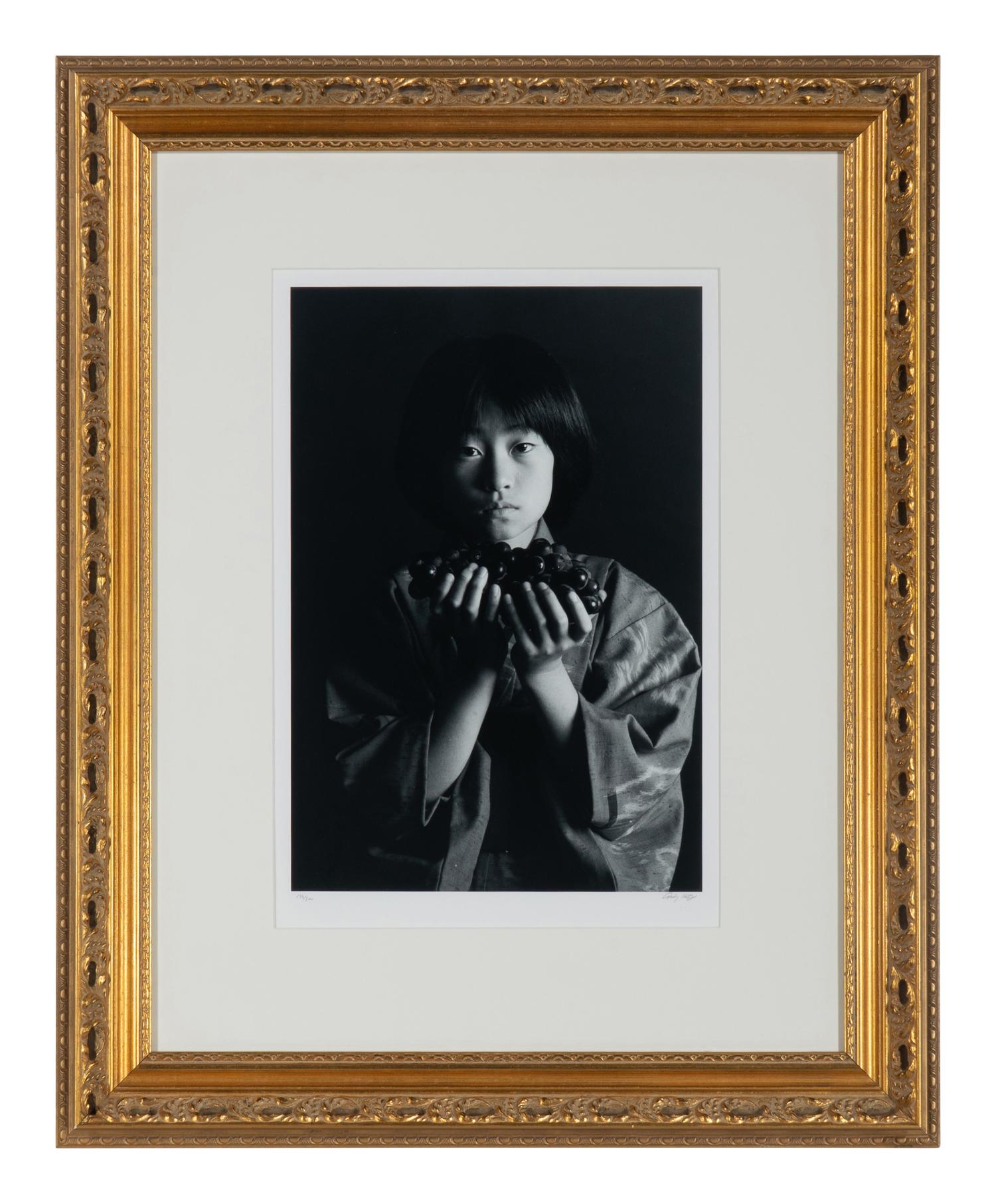 Andy Katz (American, 20th/21st century) — Girl with Grapes