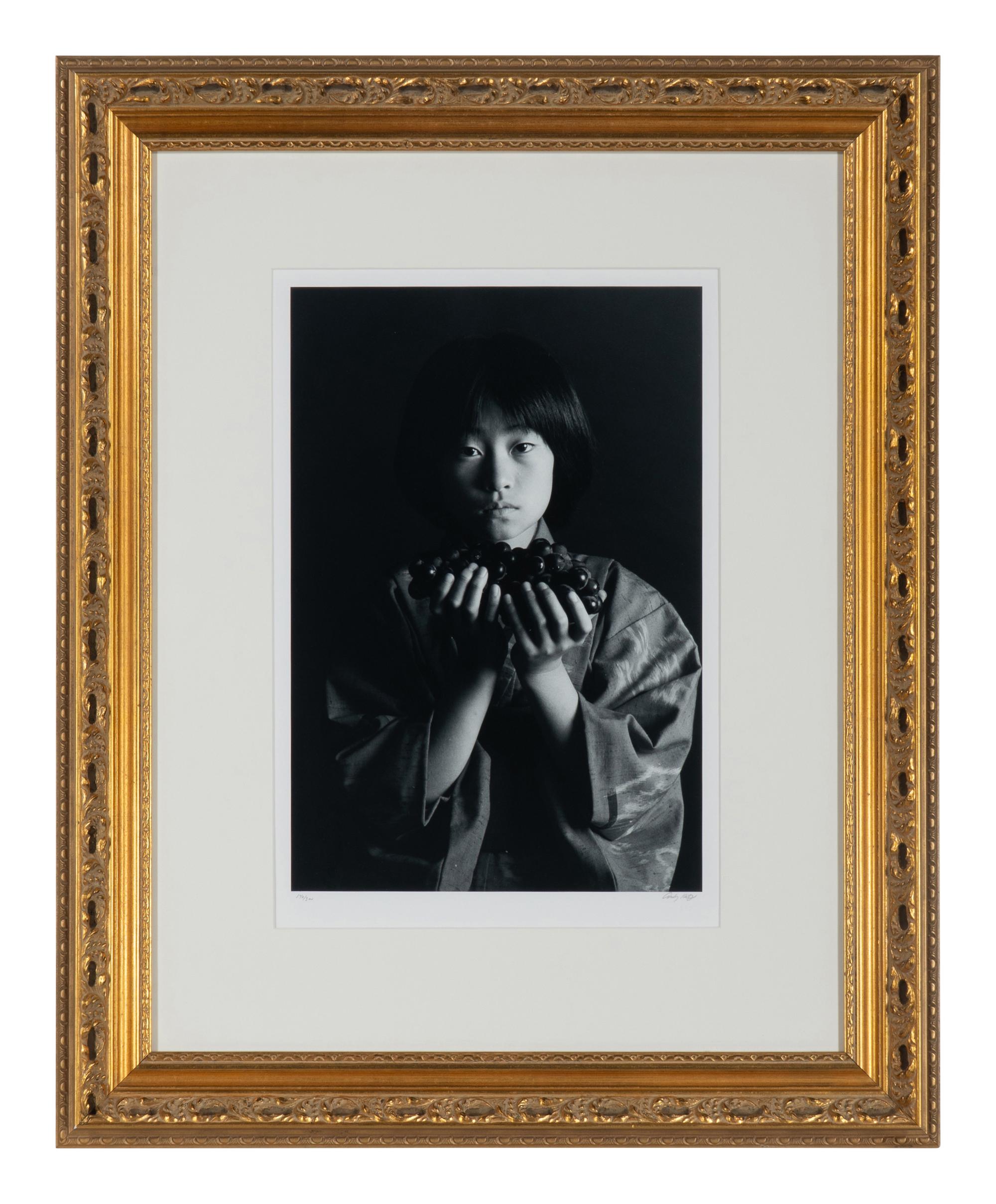 Andy Katz (American, 20th/21st century) — Girl with Grapes