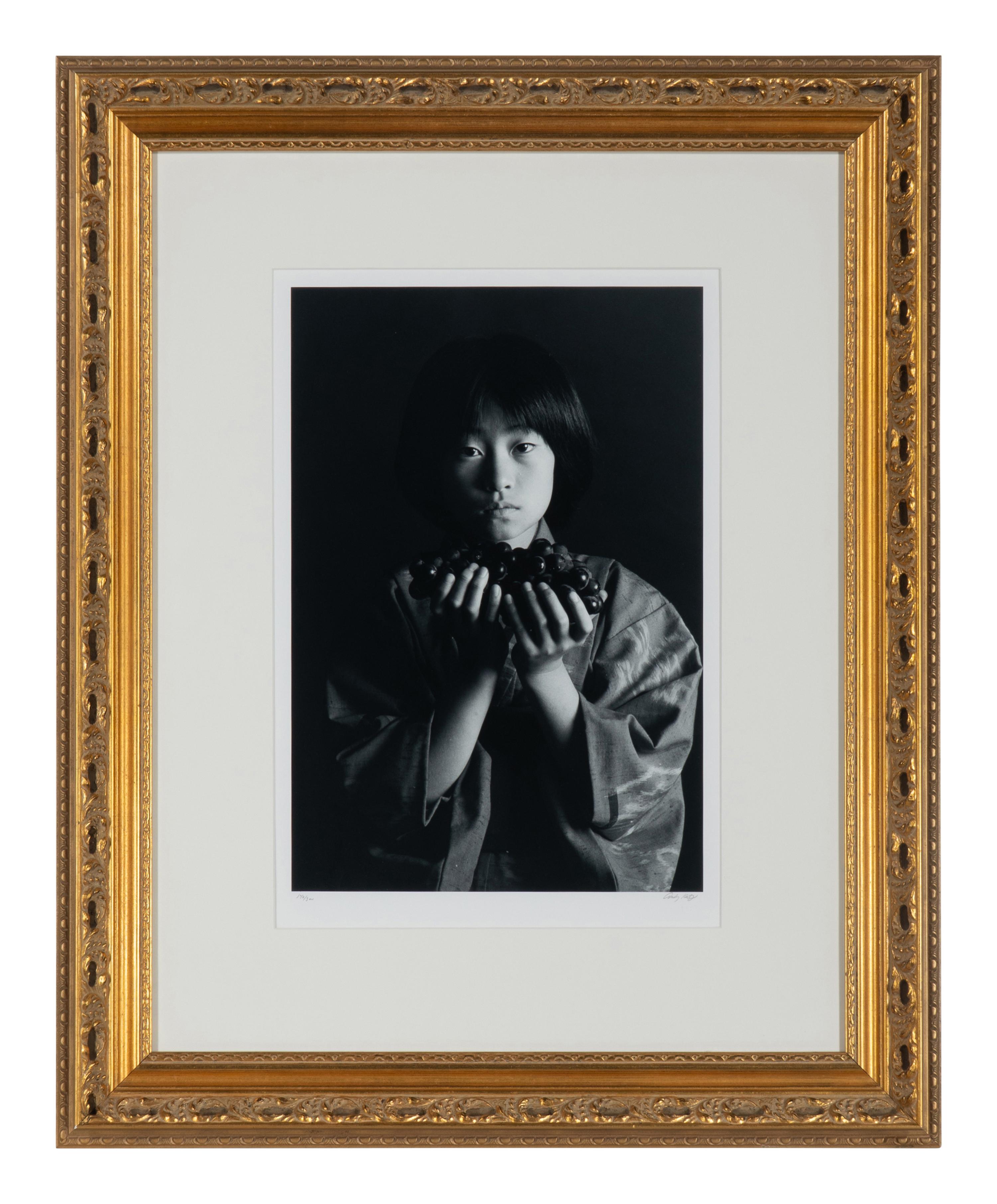 Andy Katz (American, 20th/21st century) — Girl with Grapes