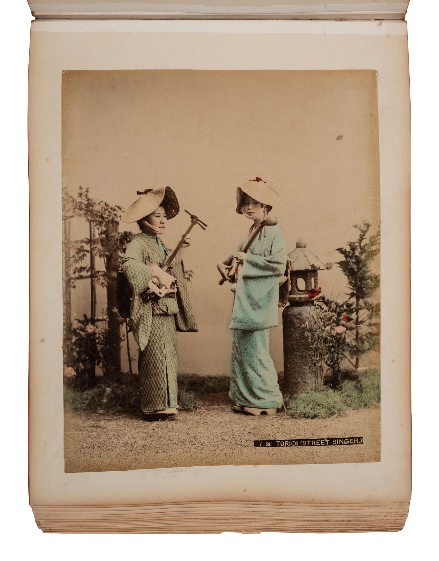 [EARLY PHOTOGRAPHY]. Album containing 50 hand-colored photographs of Japan.