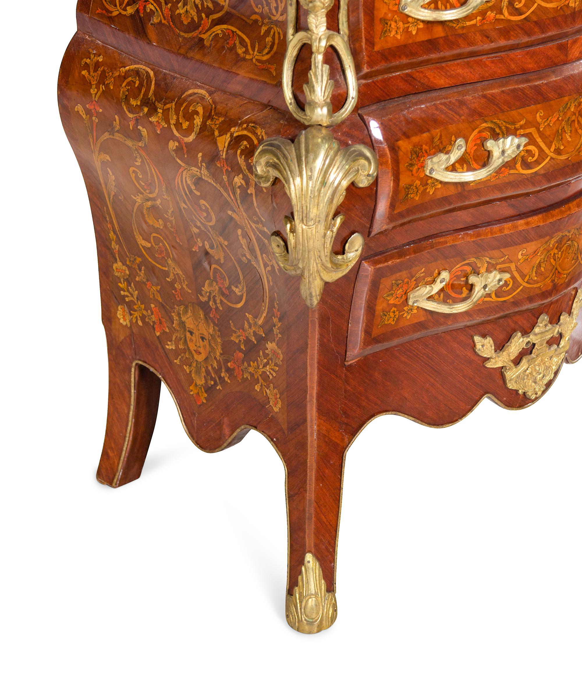 A Near Pair of Régence Style Gilt Metal Mounted Inlaid Kingwood Marble-Top Bombe Commodes