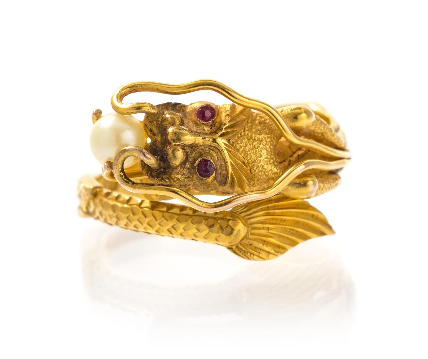 An 18 Karat Yellow Gold, Cultured Pearl and Ruby Ring, 3.90 dwts.