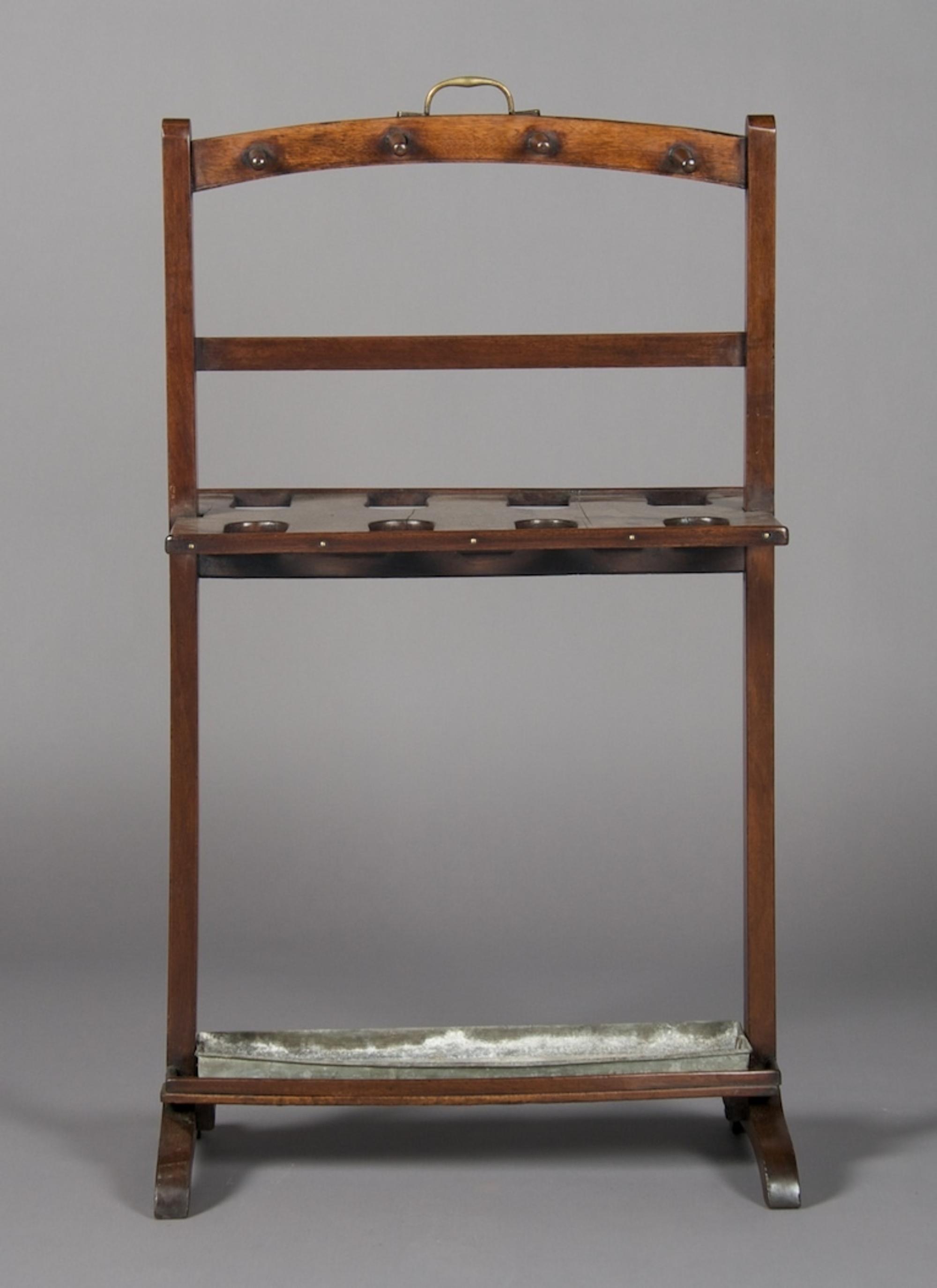 An English Mahogany Boot Jack, Height 37 inches.
