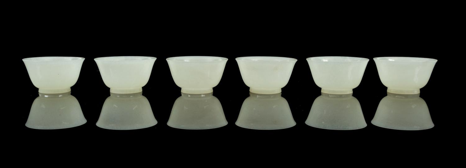 A Set of Six Jade Cups Diameter of each 2 1/4 inches.