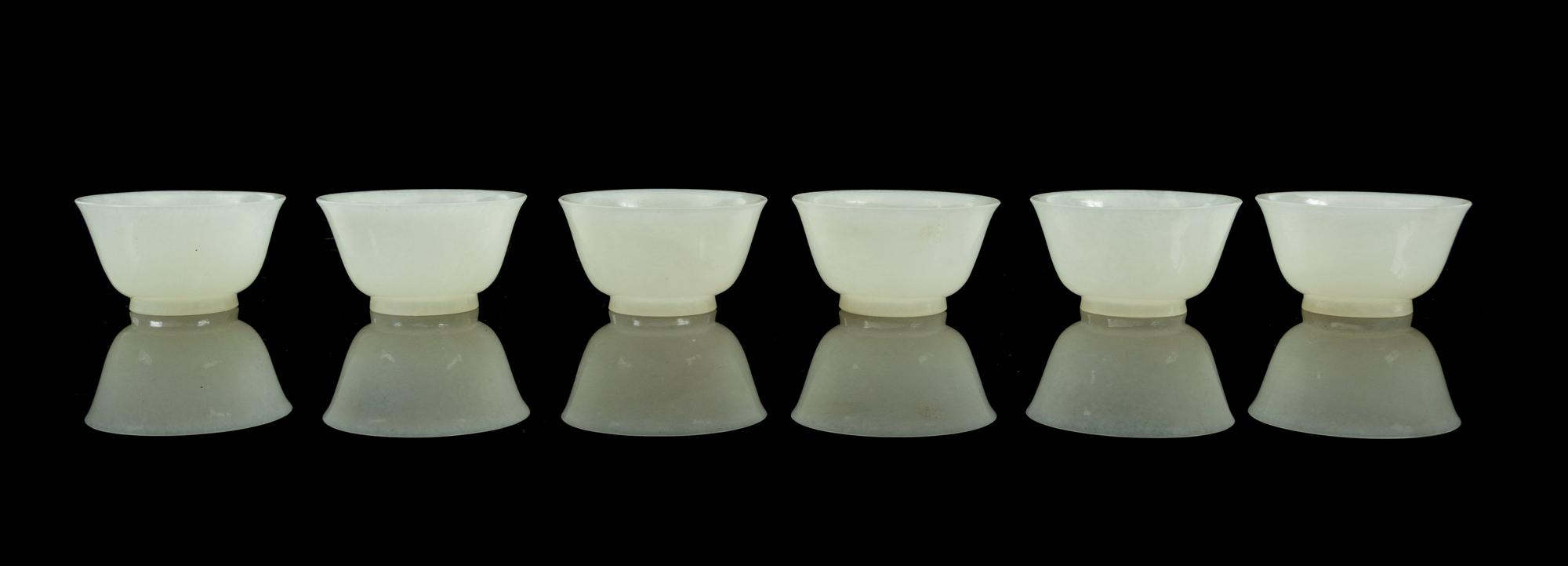 A Set of Six Jade Cups Diameter of each 2 1/4 inches.
