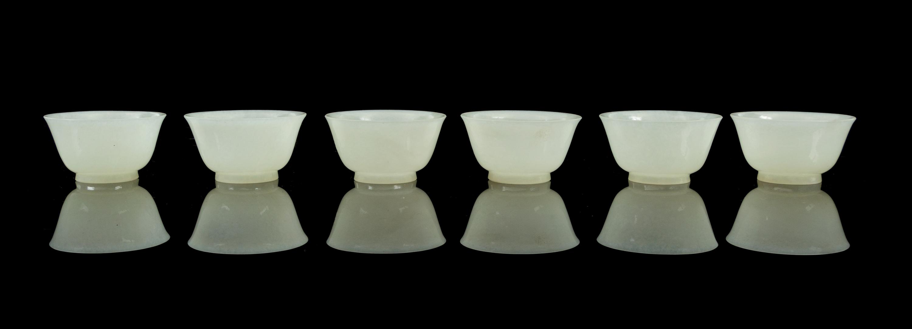 A Set of Six Jade Cups Diameter of each 2 1/4 inches.