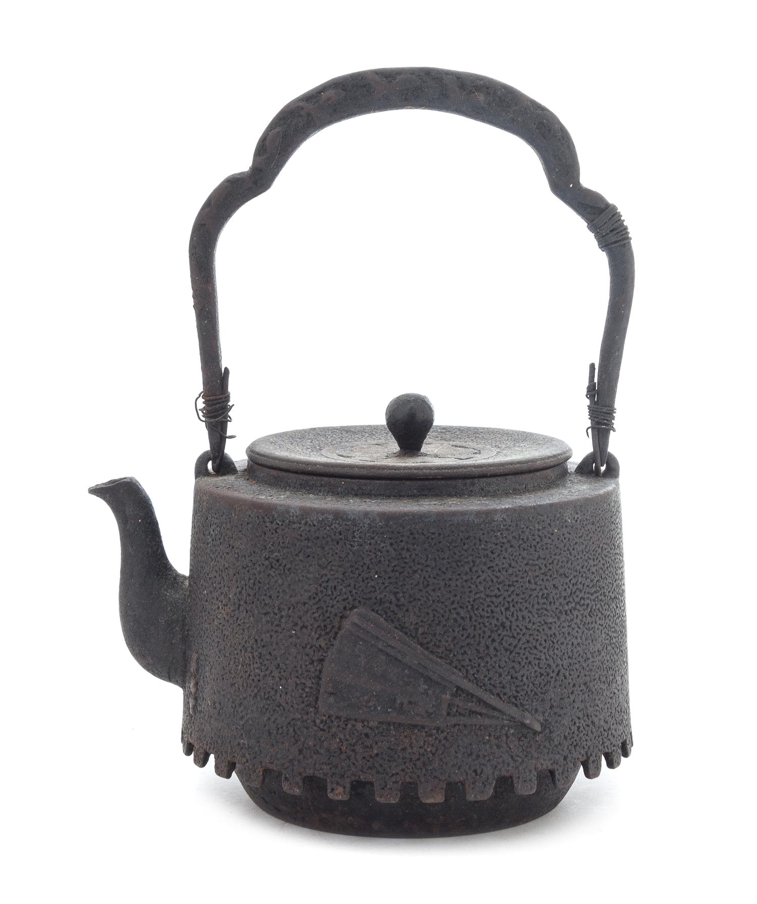 A Japanese Cast Iron Teapot Height 9 1/2 inches. — DATED 1924