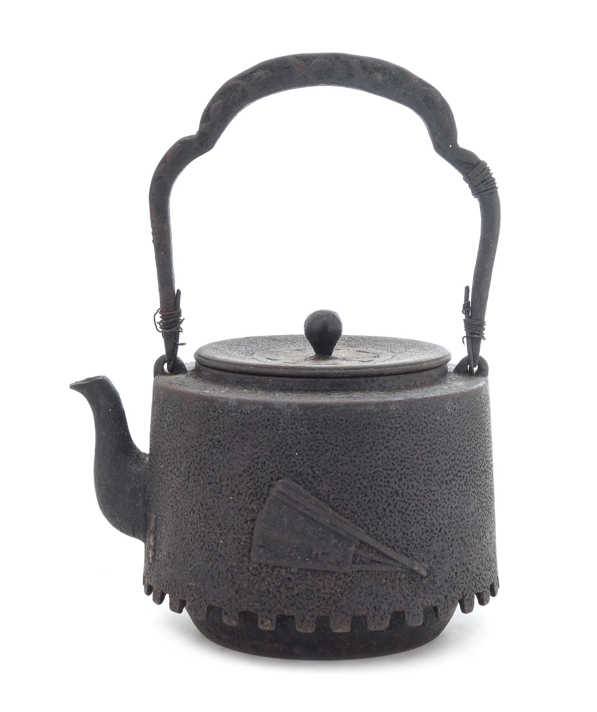 A Japanese Cast Iron Teapot Height 9 1/2 inches. — DATED 1924