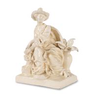 A French White Glazed Faience Chinoiserie Figure