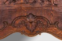 A Belgian Louis XV Style Carved Oak Trumeau Mirror