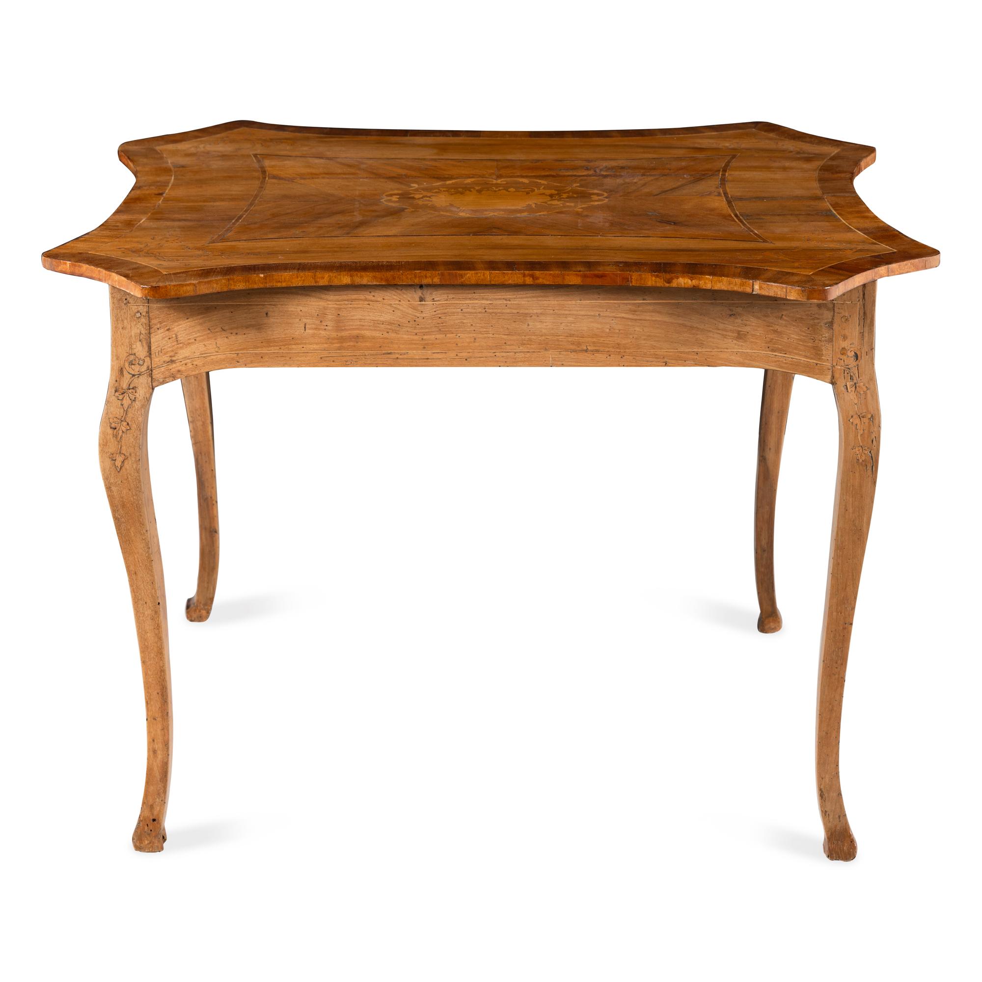 An Italian Walnut and Fruitwood Center Table