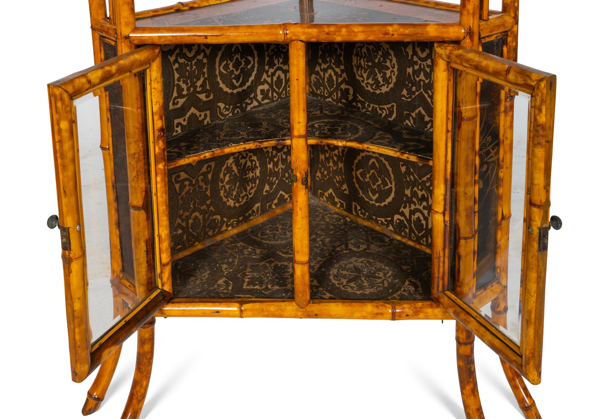 An Edwardian Chinoiserie Decorated Bamboo Corner Cabinet