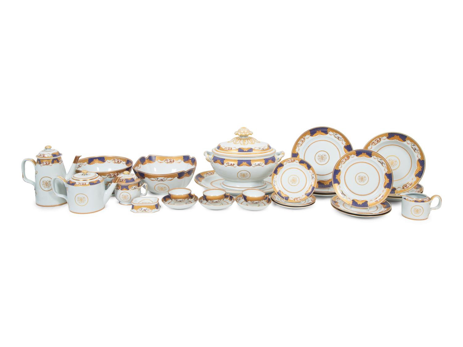 A Mottahedeh Porcelain Golden Butterfly Dinner Service