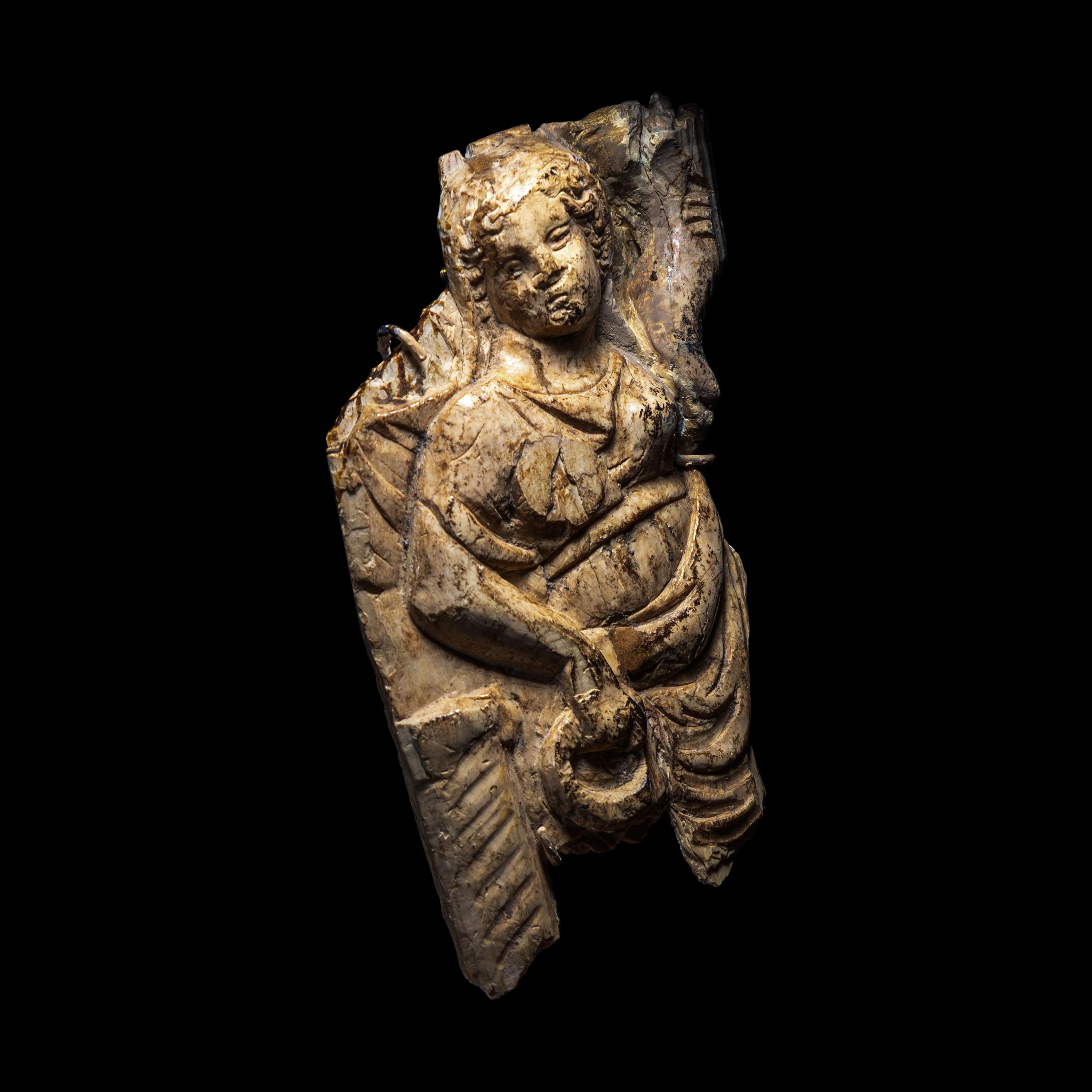 A Roman Bone Fragment with Fortuna