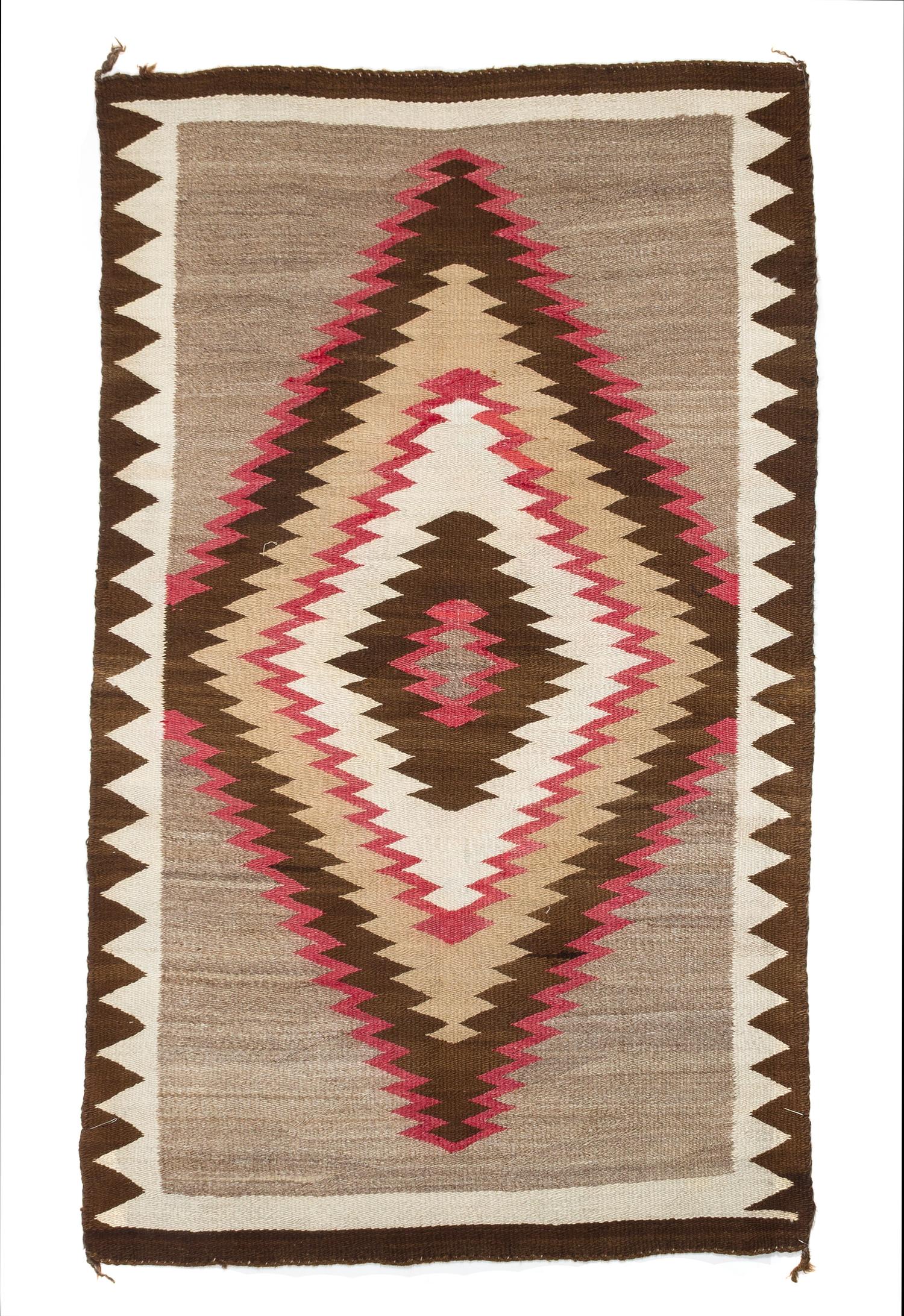 A Navajo Rug 67 x 40 inches.