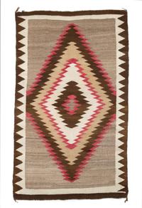 A Navajo Rug 67 x 40 inches.