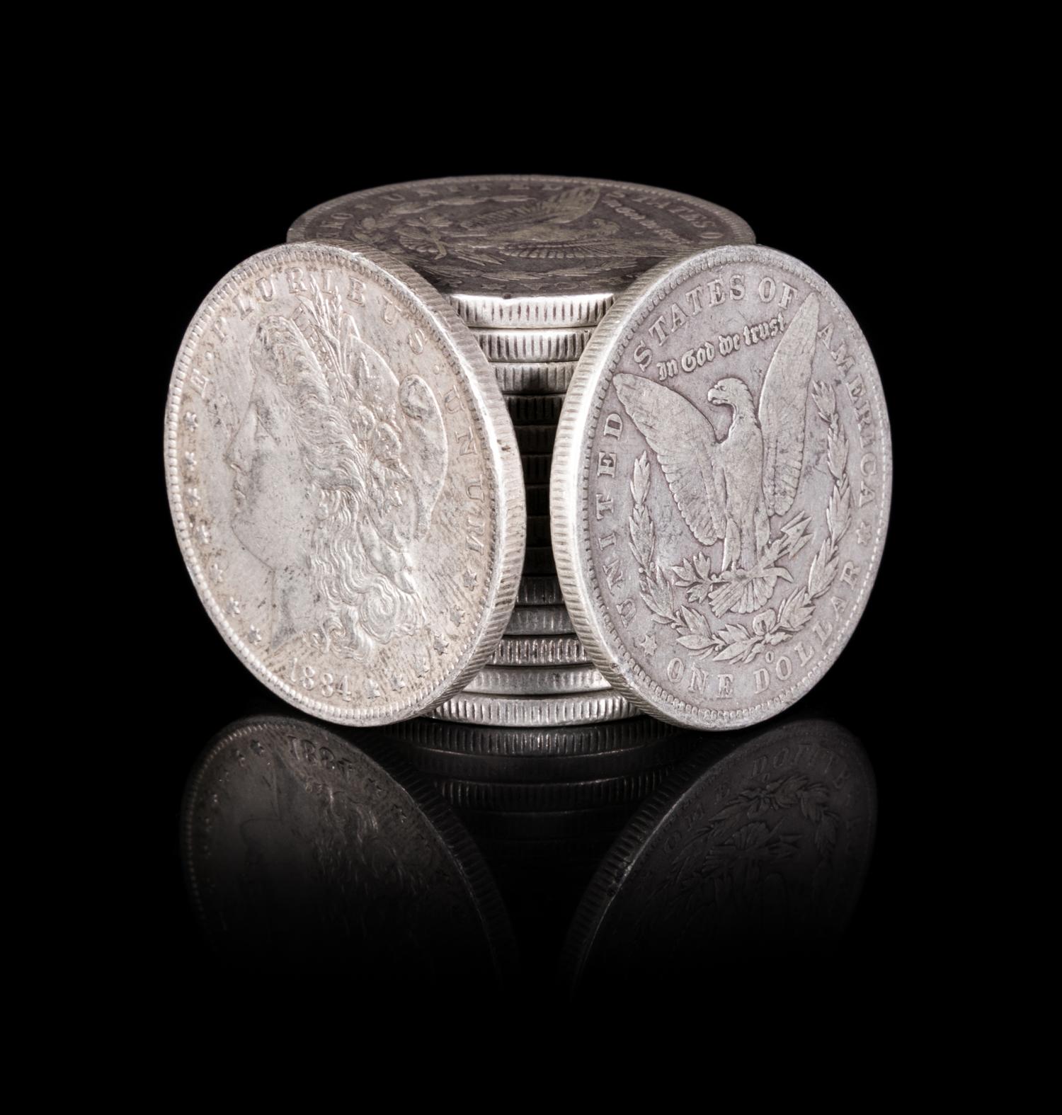 A Group of Sixteen United States 1884-O Morgan Silver Dollar Coins