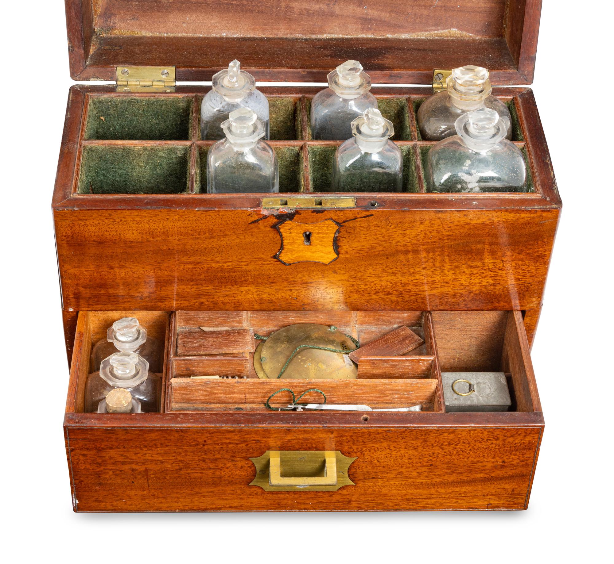 An English Mahogany-Cased Bottle Caddy or Apothecary Chest