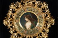 A Vienna Porcelain Cabinet Plate in a Florentine Giltwood Frame