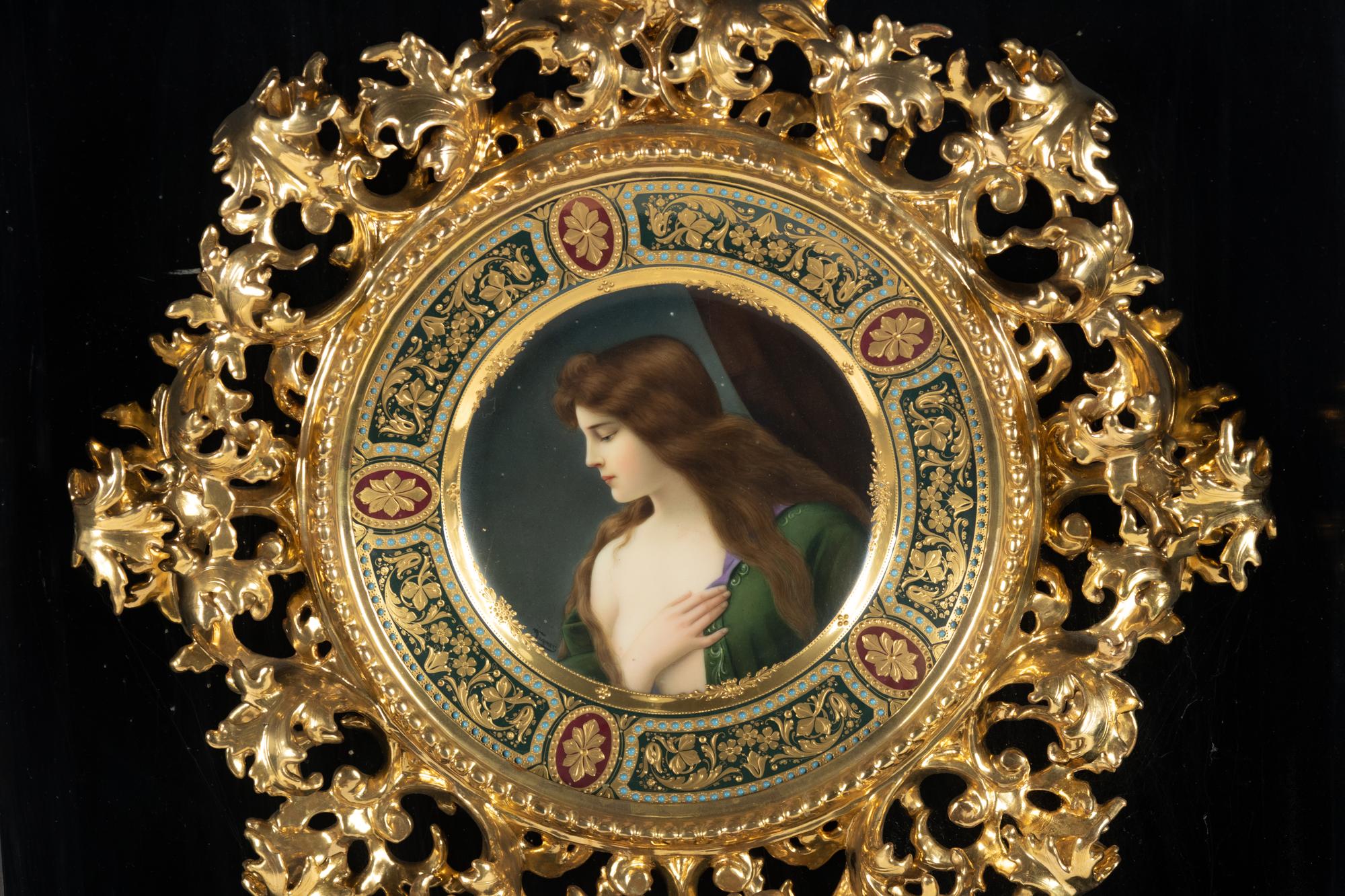 A Vienna Porcelain Cabinet Plate in a Florentine Giltwood Frame