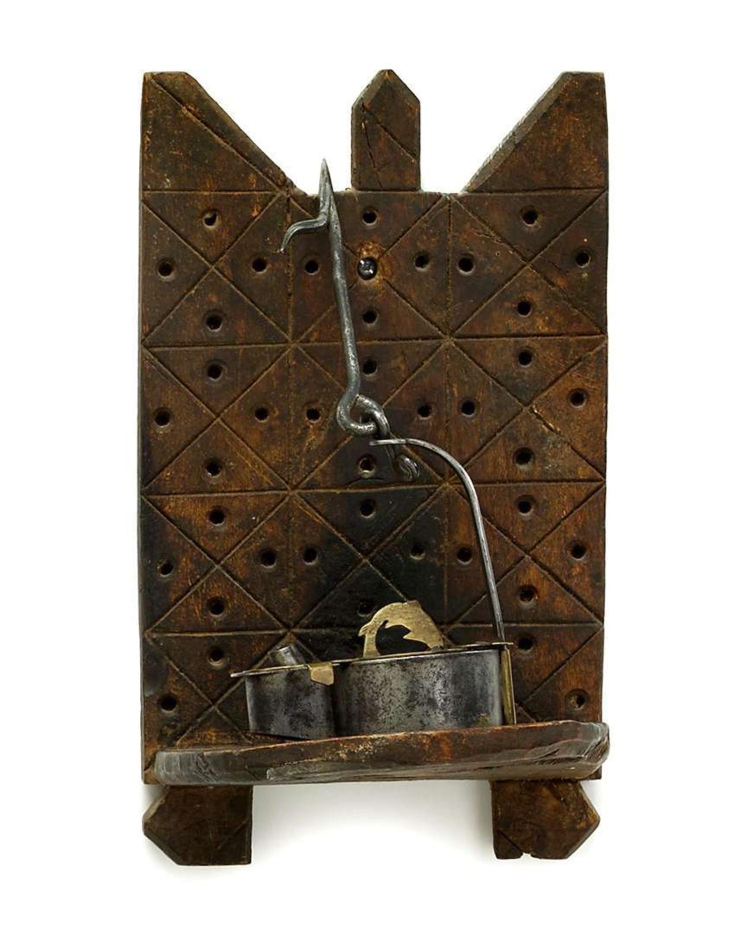 Iron and brass Betty lamp with wooden candlestick shelf pennsylvania and new england, 18th/19th century